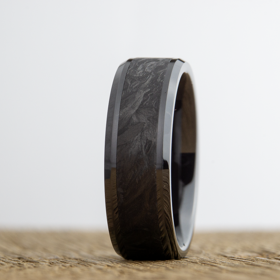 black wedding ring with forged carbon fiber