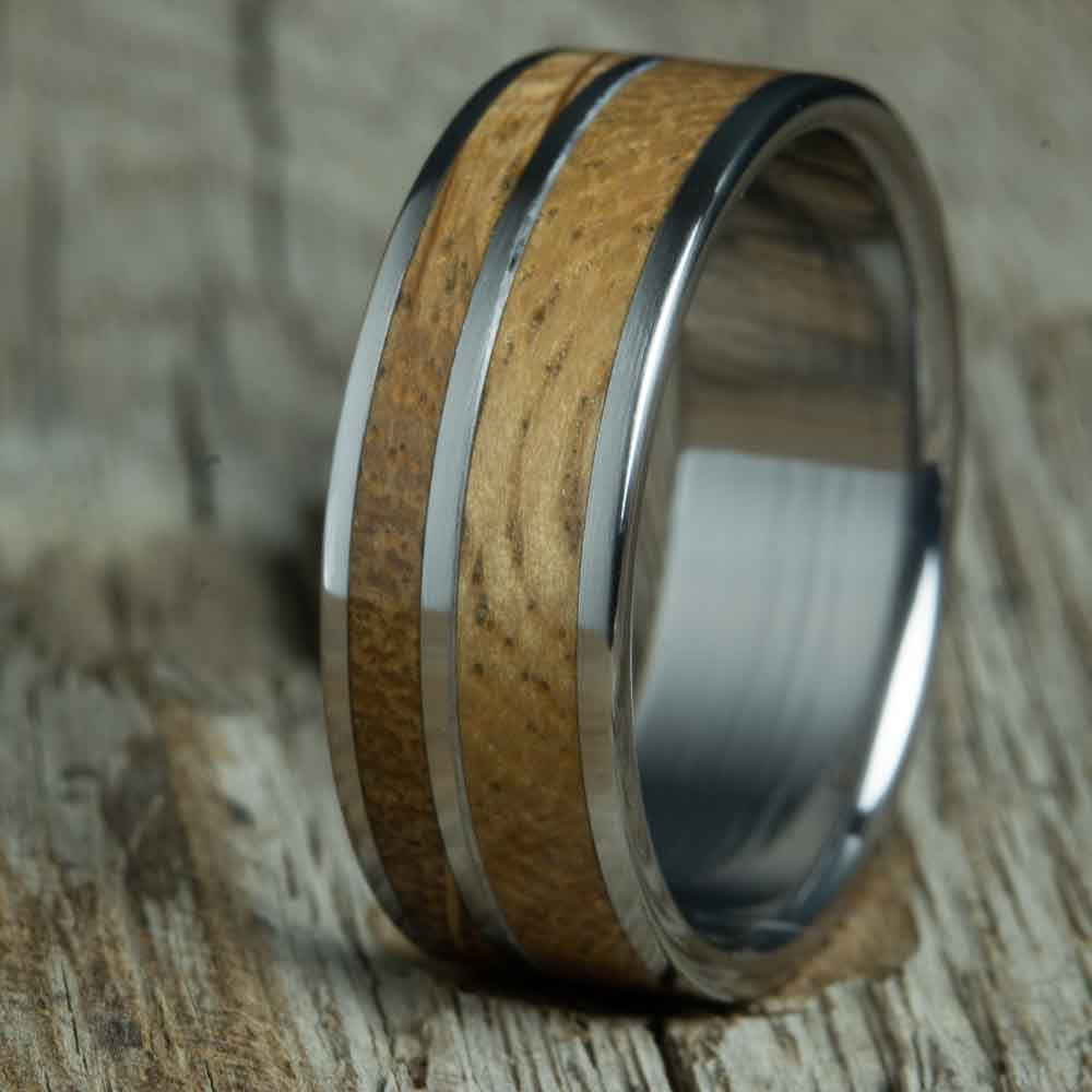 titanium and bourbon barrel wood inlay ring