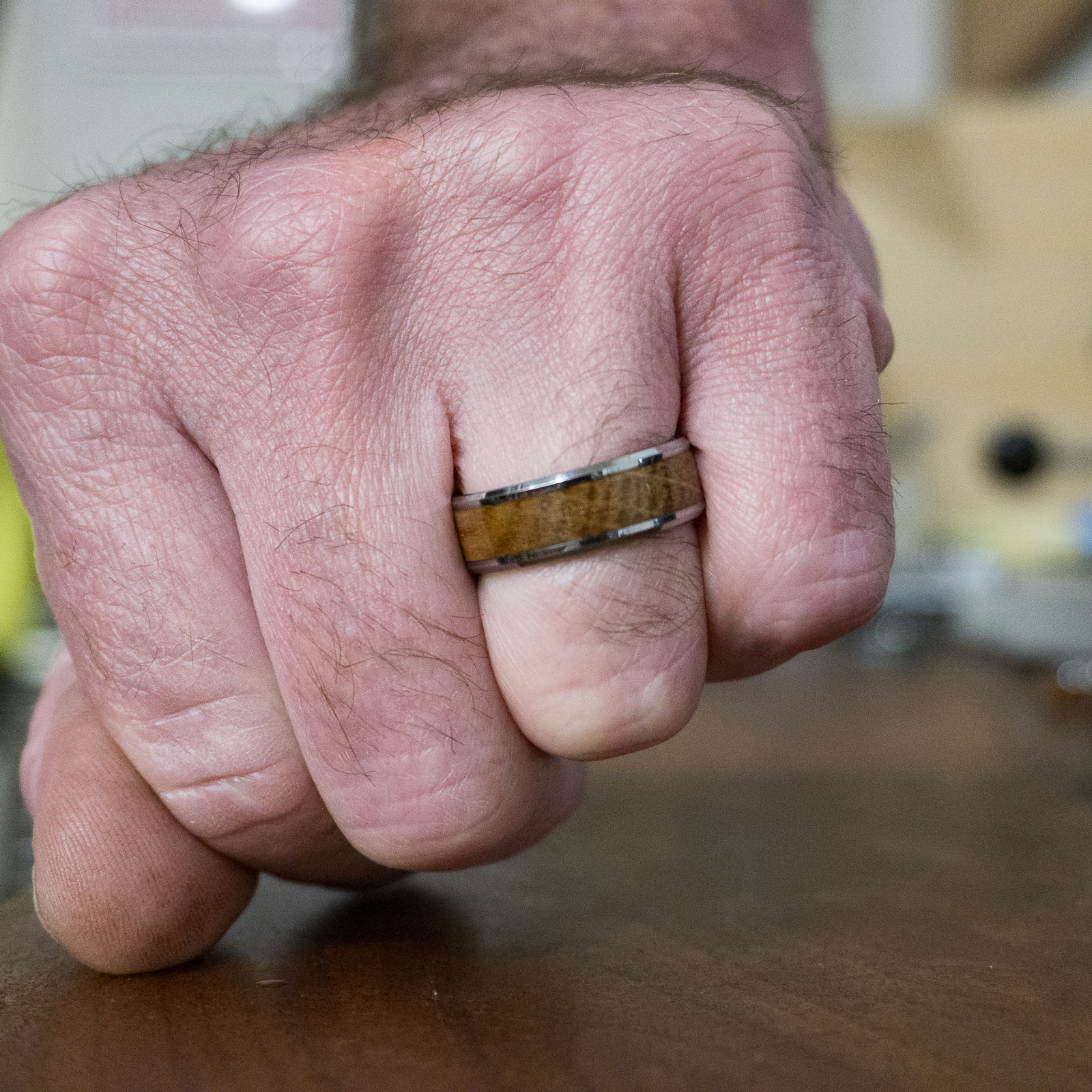 The Captain- whiskey barrel ring on finger