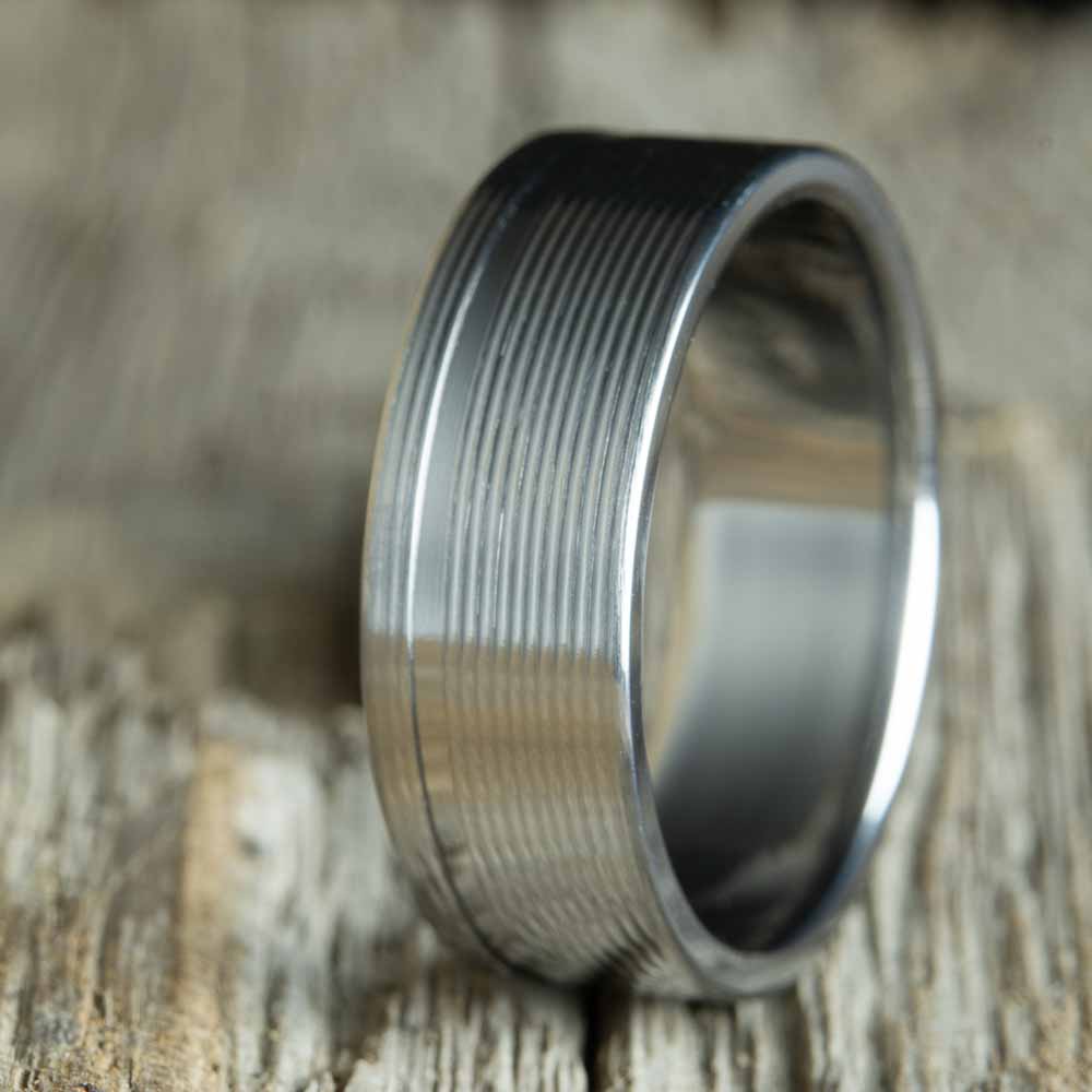 polished titanium wedding band handcrafted by Peacefield Titanium