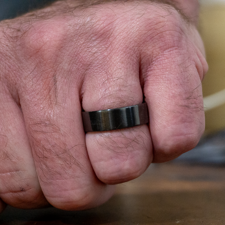 black titanium ring on finger