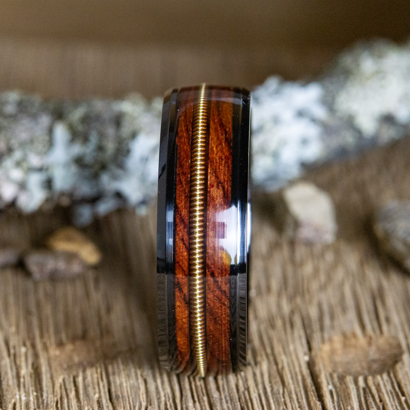 black ring with rosewood and guitar string