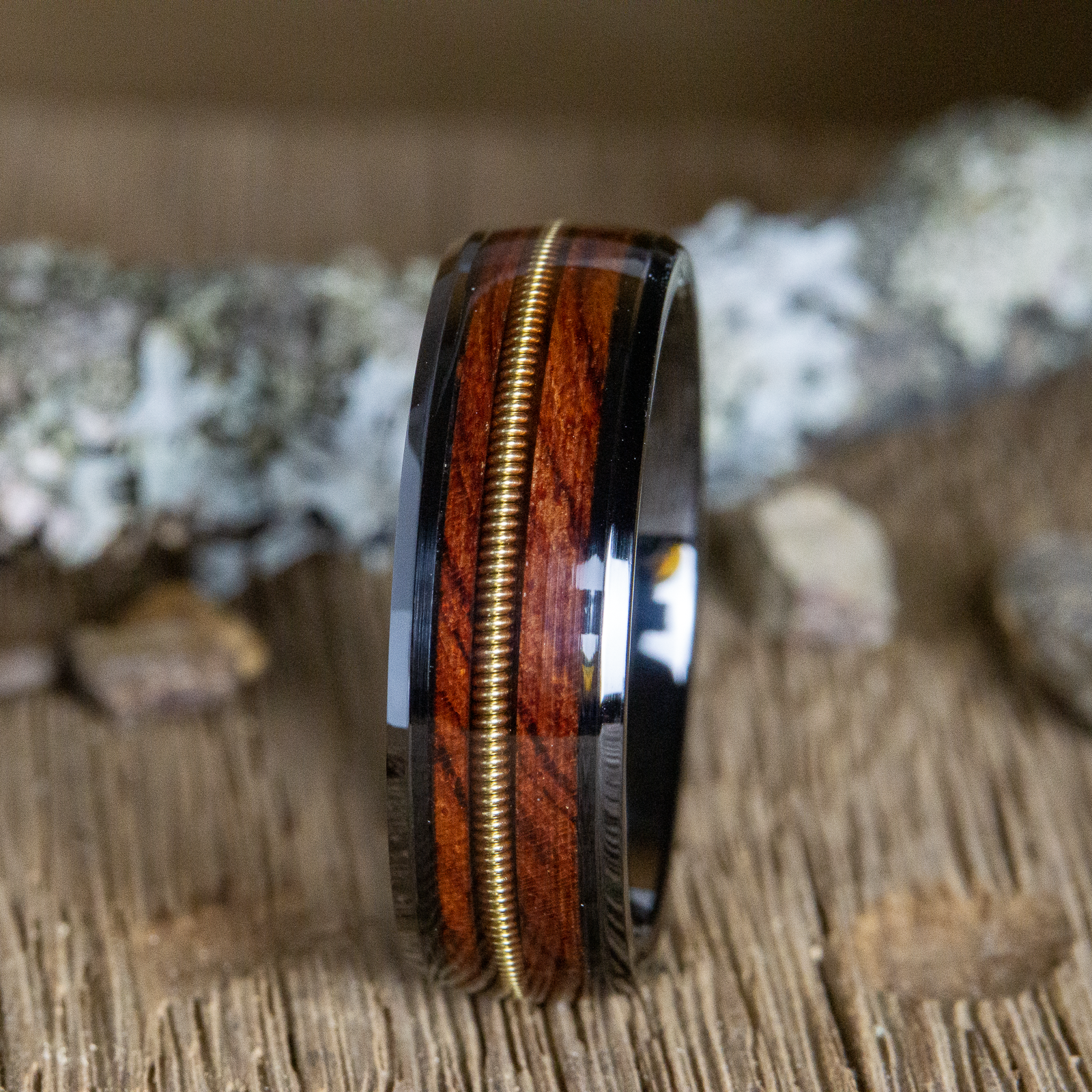 black ring with rosewood and guitar string