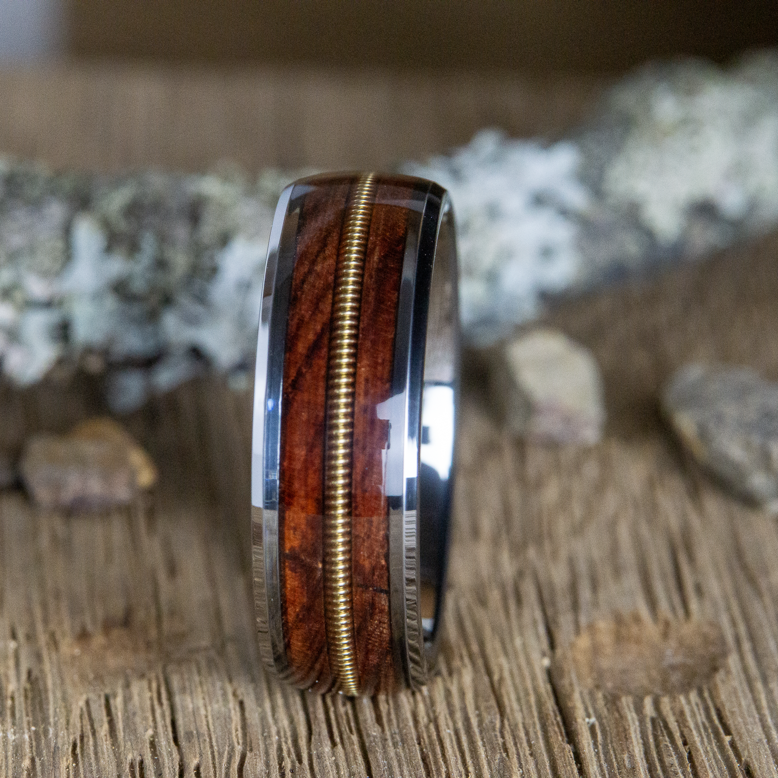 tungsten ring with rosewood and guitar string 