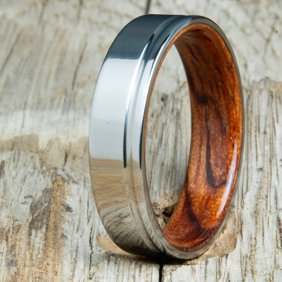 Titanium wedding bands with Bubinga interior. Unique handcrafted rings and bands made by Peacefield Titanium.