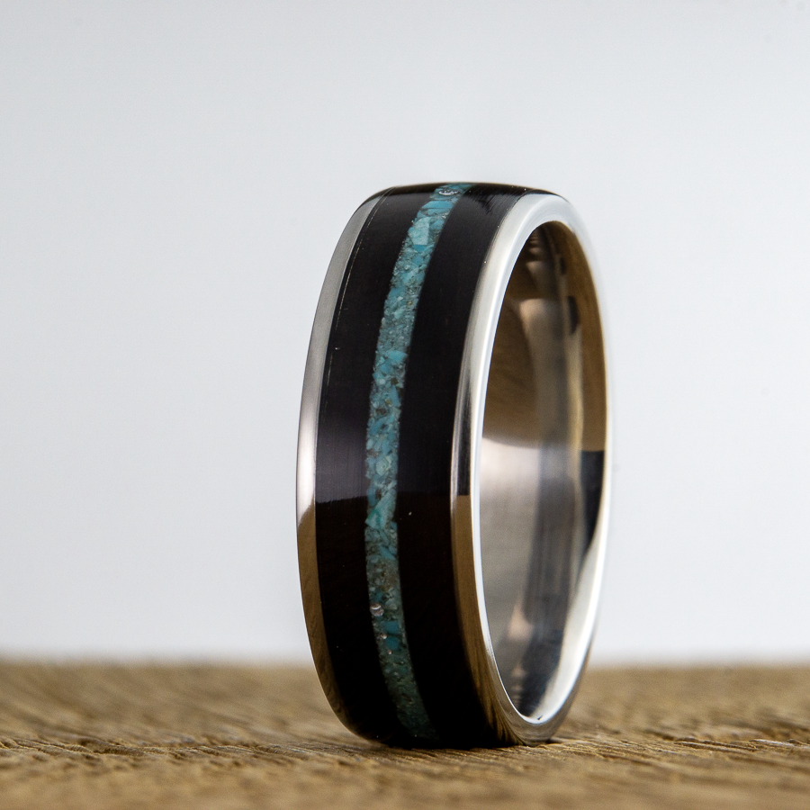 ebony wood ring with turquoise and titanium