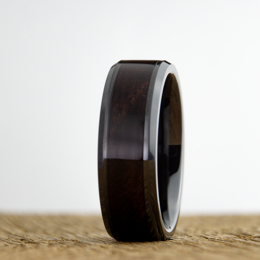 Black ring with walnut wood