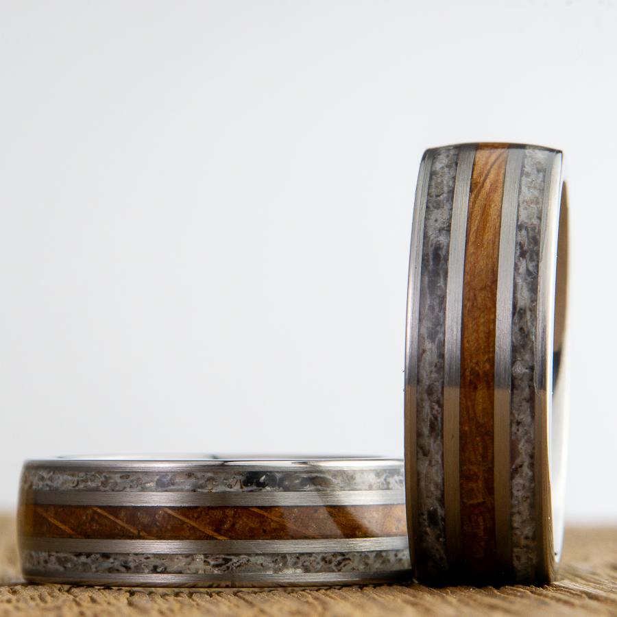 wedding ring pair with deer antler and whiskey barrel wood