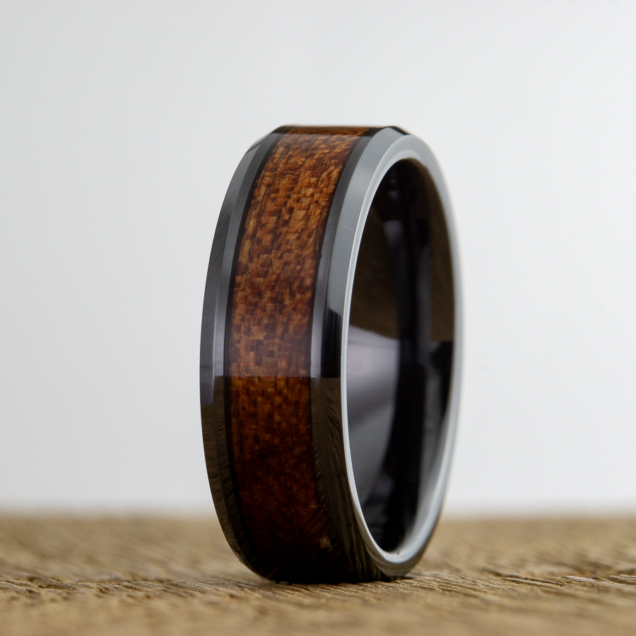 black wedding ring with wood inlay