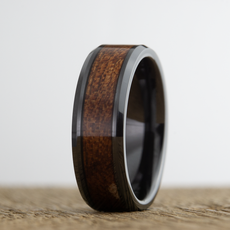 wooden wedding band with black ceramic