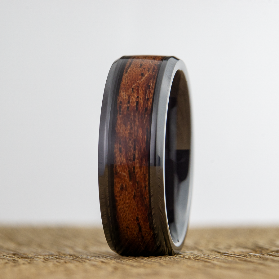 black wedding ring with red Bubinga wood inlay