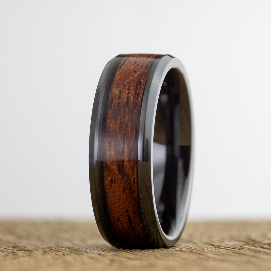 Black ring with red bubinga wooden inlay